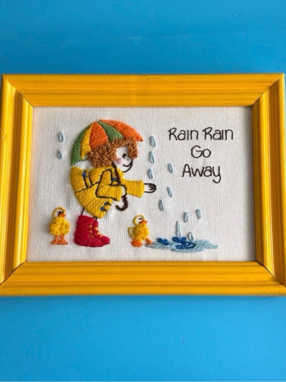 Yellow Framed Vintage Crewel Needlework “Rain Rain Go Away” Super Clean